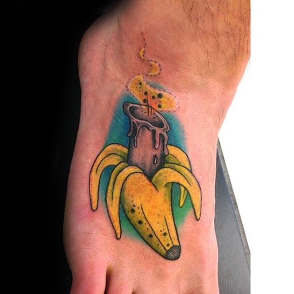 Banana With Candle Guys Tattoo Designs On Foot