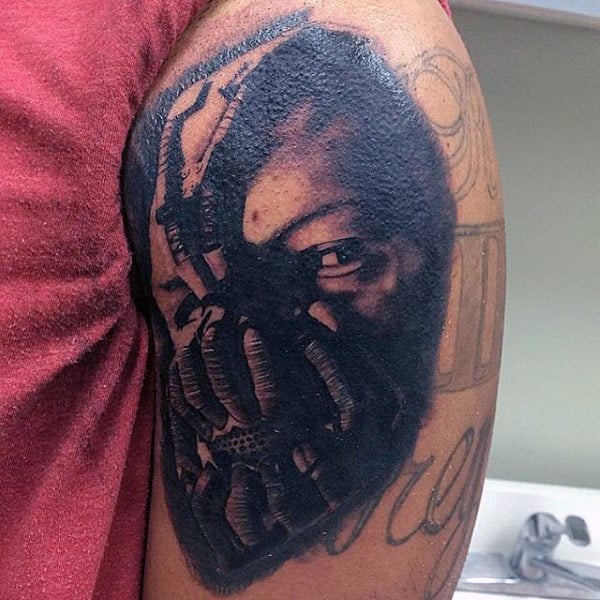 Bane Batman Upper Arm Black Ink Shaded Tattoo Design Ideas