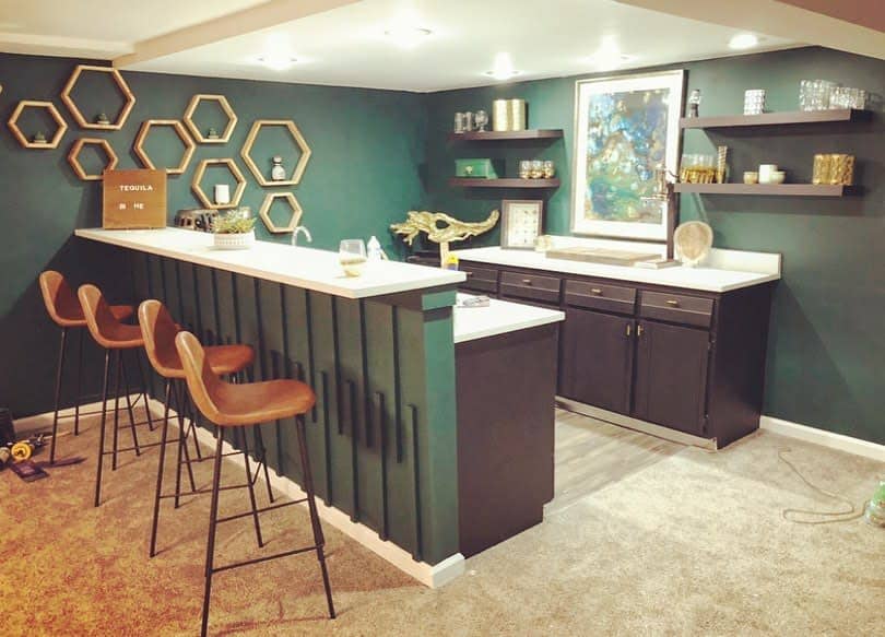 small basement bar with carpet floor