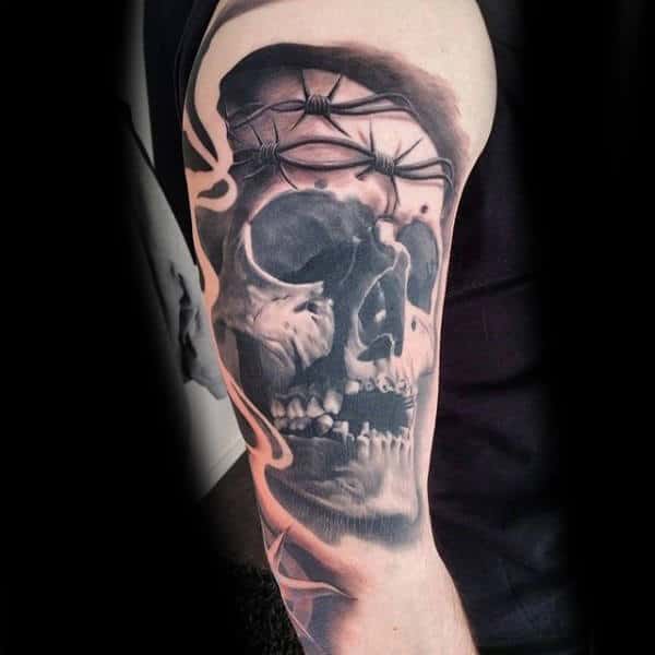 Barbed Wire Bicep Tattoo On Man With Skull Shaded Black Ink Design