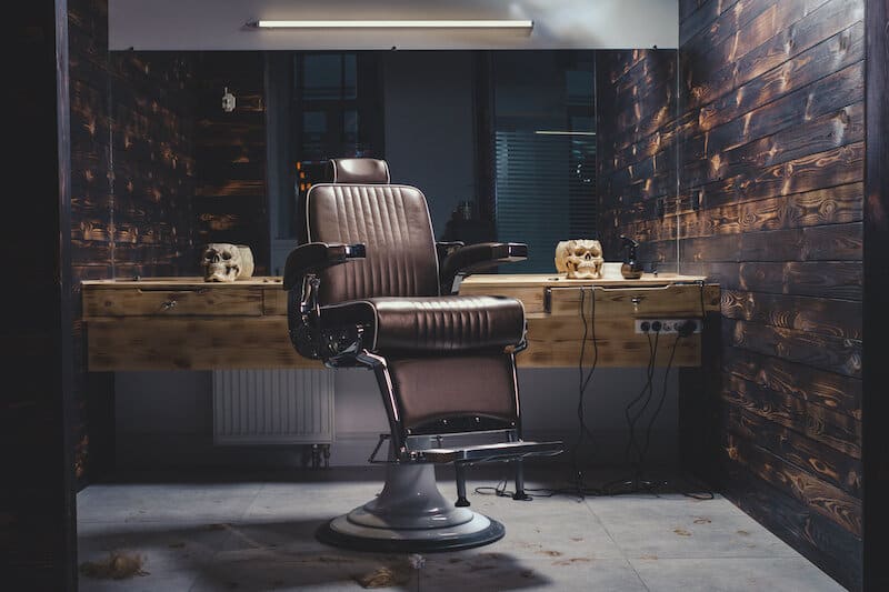 brown leather barber shop chair