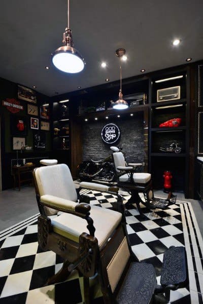 Luxury barbershop with vintage chairs, checkered flooring, and motorcycle-themed decor.