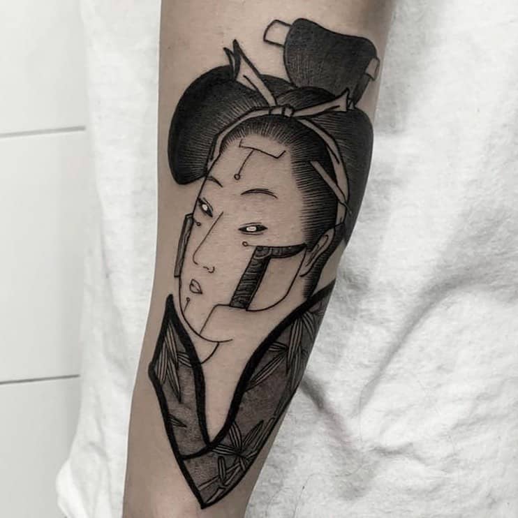 Black ink forearm tattoo of a Geisha with bold linework, intricate hair ornaments, and a modern abstract twist on traditional Japanese art.