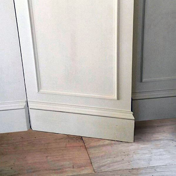 baseboard and chair rail moldings hidden door
