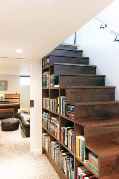 basement wood bookcase under stairs ideas