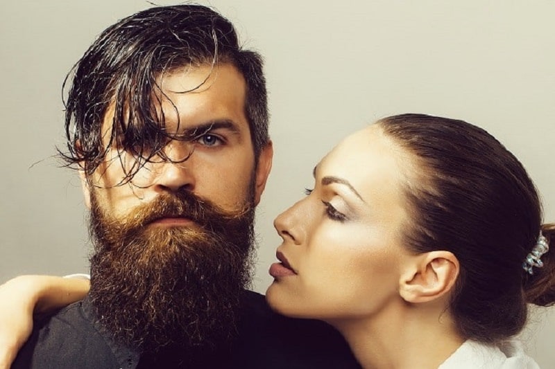 bearded man with woman