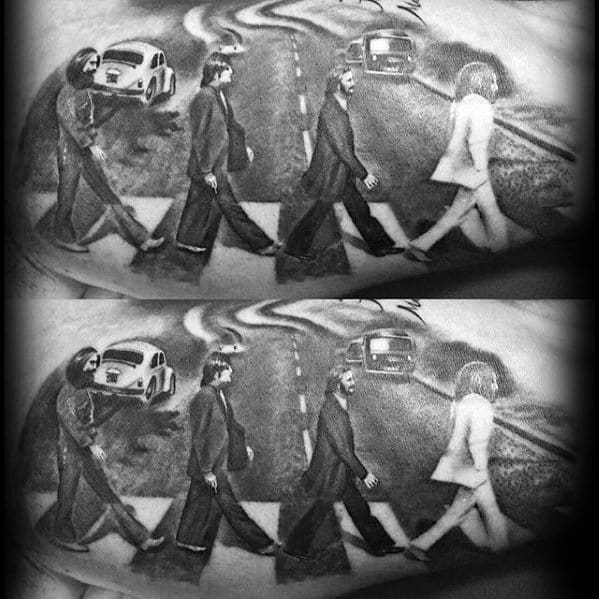 Realistic tattoo of The Beatles’ Abbey Road cover with detailed backgrounds, cars, and street, repeated twice in a mirrored layout.
