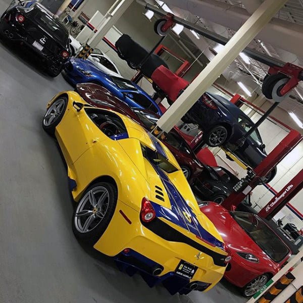 A vibrant dream garage showcasing luxury sports cars and efficient use of lifts for maximum storage.