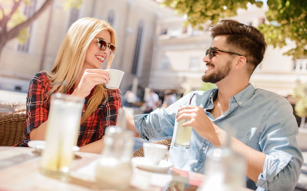 beautiful loving couple sitting in cafe