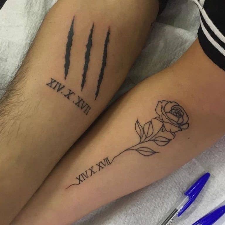 Matching couple tattoos featuring a rose with a date on one arm and claw marks with the same date on the other, symbolizing 'Beauty and the Beast'.