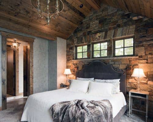 cabin style stone bedroom