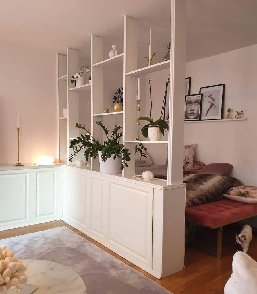white bedroom divider with shelves