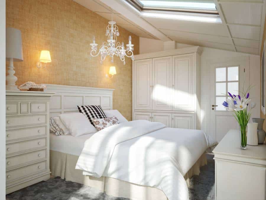 attic bedroom feature wall chandelier white cabinets wardrobe 
