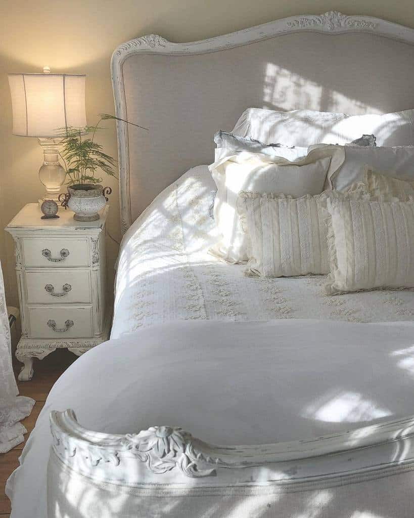 french country bedroom white bed and bedside table 
