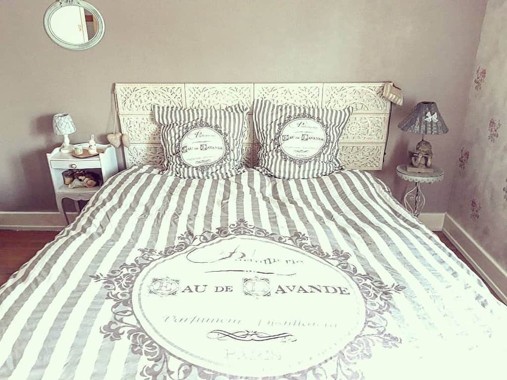 elegant french country bed floral wallpaper carved headboard