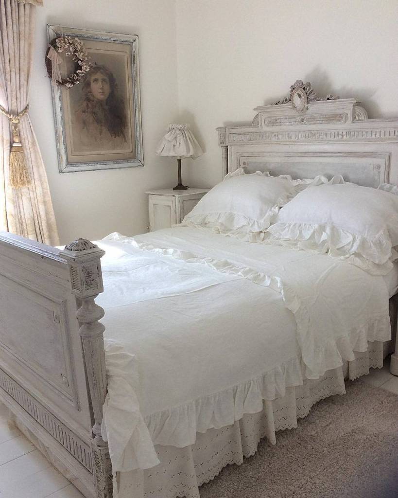 carved headboard large bed vintage bedroom framed wall painting 