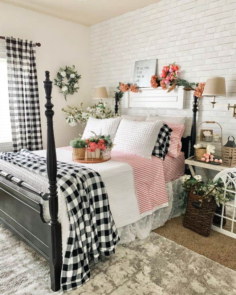 Country-style bedroom with four-poster bed, plaid accents, and floral decorations.