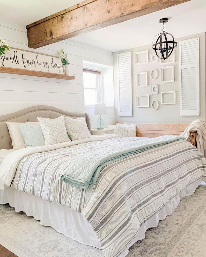 rustic farmhouse bedroom with exposed ceiling wood beam