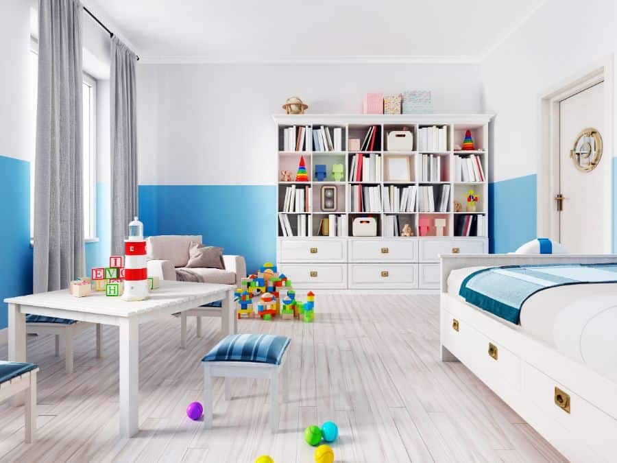 large spacious kids bedroom with bookshelf and table