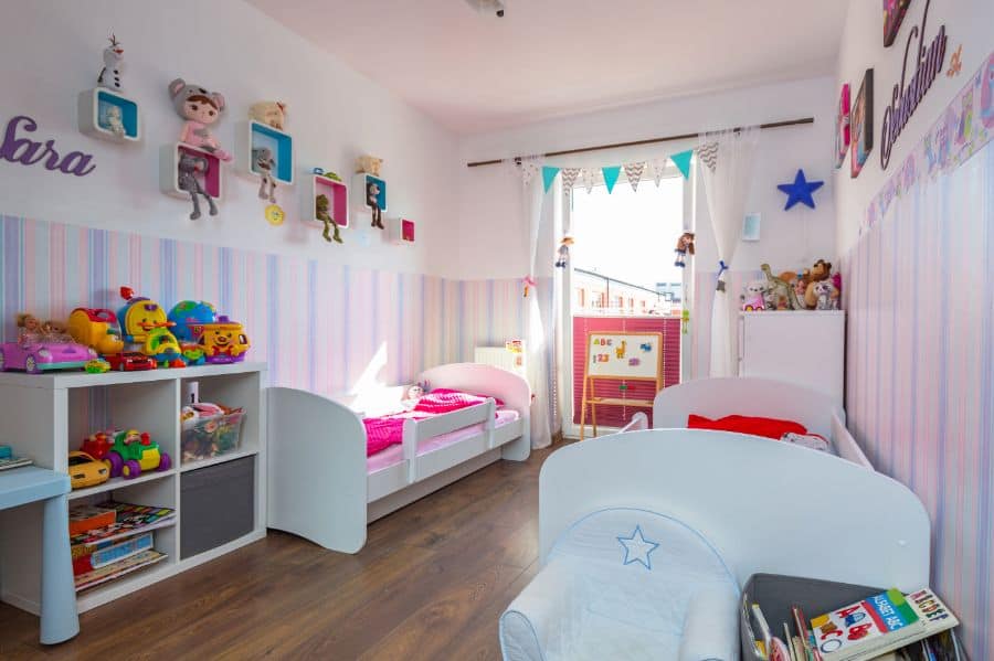 colorful kids bedroom with wall art