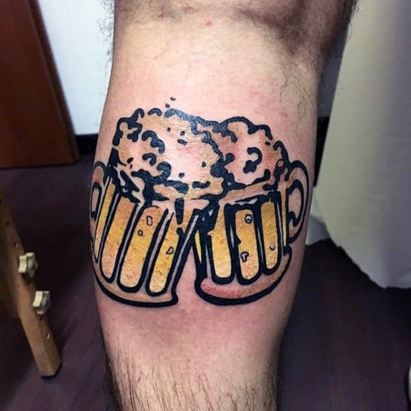Bold and colorful tattoo of two frothy beer mugs clinking together, outlined in thick black ink with golden yellow fill for a celebratory, cartoon-like vibe.
