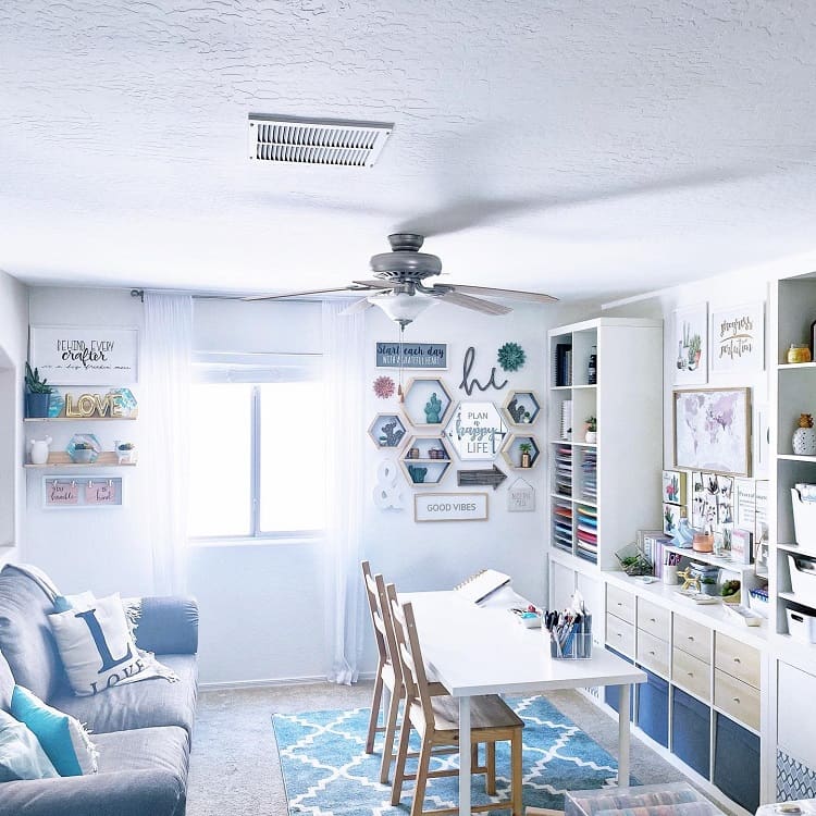 multipurpose spare bedroom with sofa and craft area