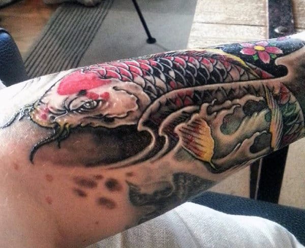 Bicep Koi Fish Tattoo For Men