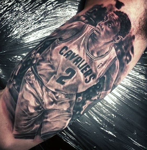 Detailed tattoo of a basketball player wearing a "Cavaliers" jersey with the number 2 on.