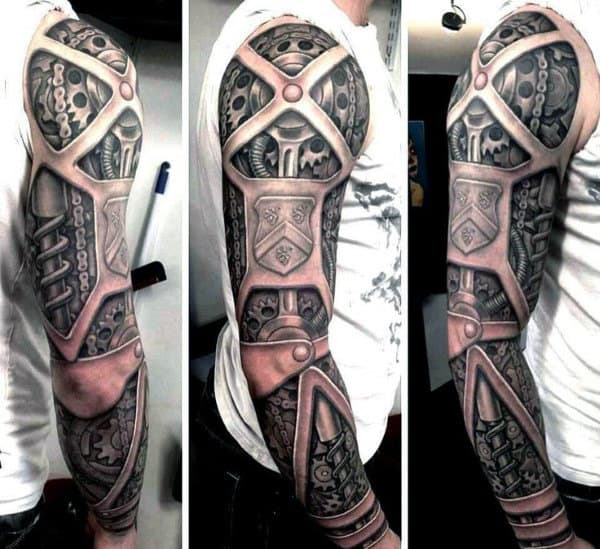 Man's arm with detailed biomechanical sleeve tattoo