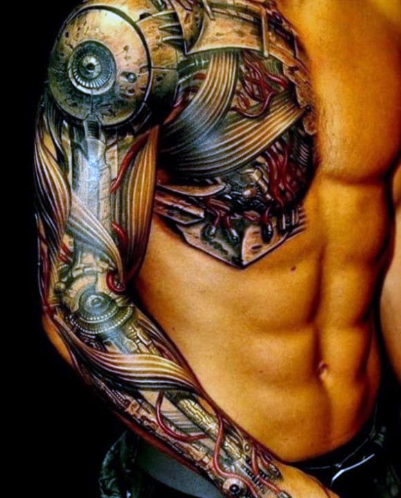 Man showcasing detailed biomechanical tattoos