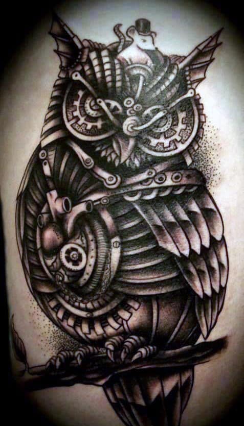 Steampunk owl tattoo with gears and a small mouse wearing a hat