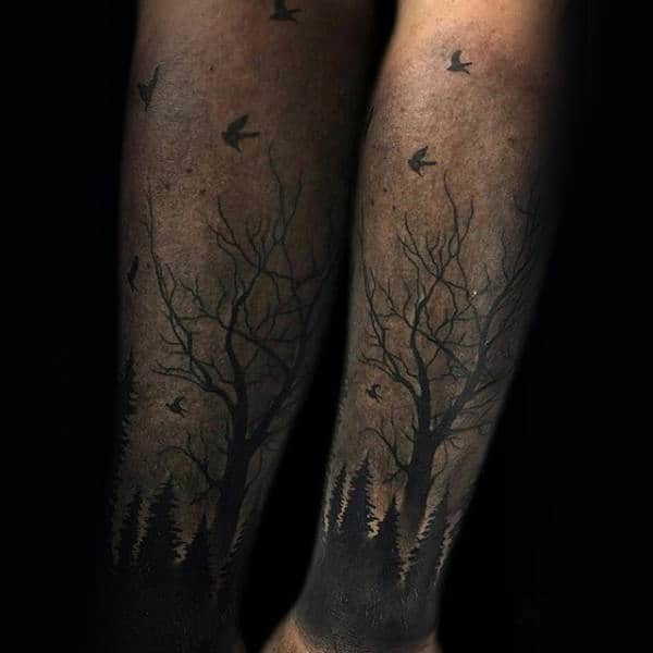 Birds Flying Over Trees Mens Forearm Tattoo