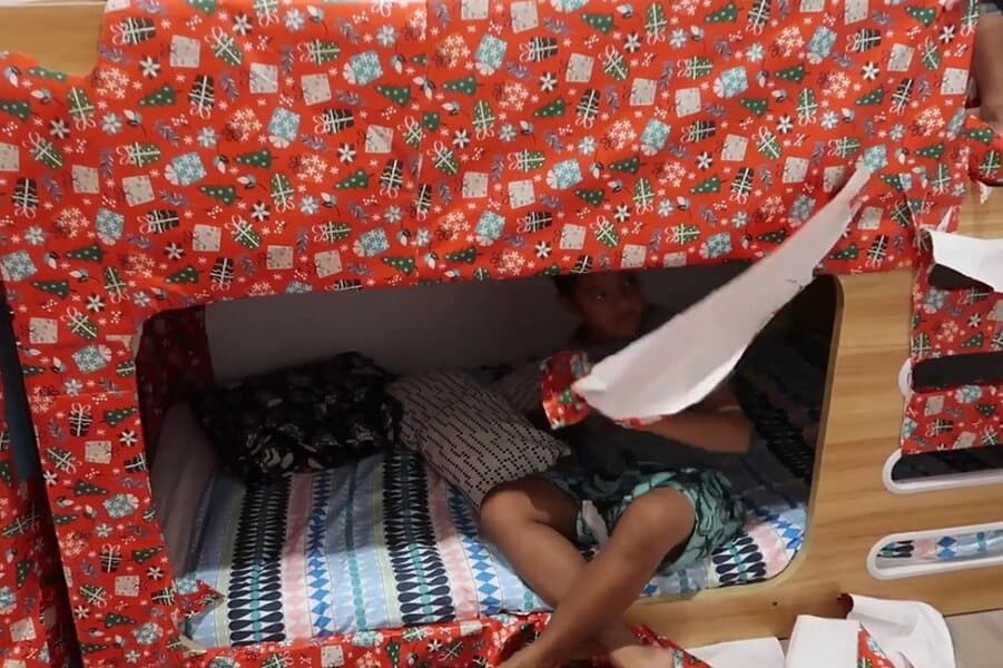 birthday wrapping paper in bed