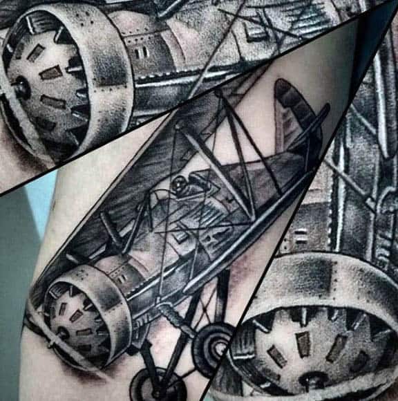 Detailed tattoo of a vintage airplane, showcasing intricate design from multiple angles