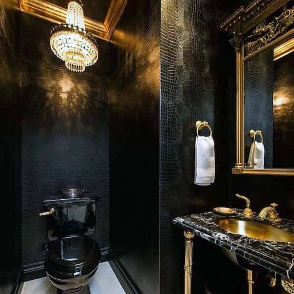 Sophisticated bold and modern black bathroom with gold accents and luxurious finishes.
