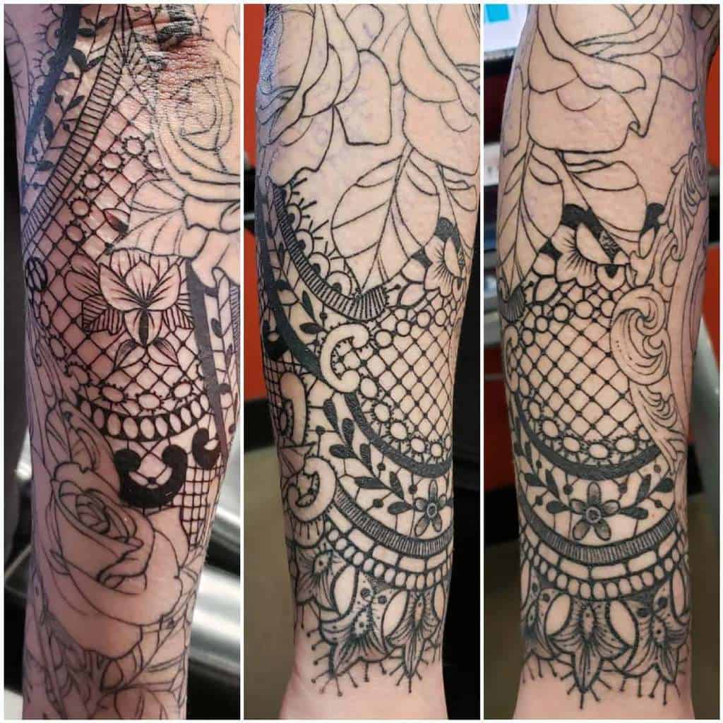 Intricate black lace tattoo sleeve with floral patterns, delicate netting, and ornamental details for an elegant, feminine look.