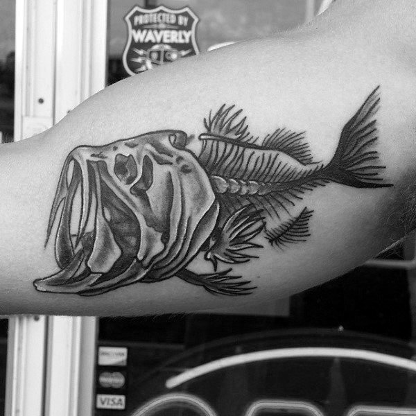 Black And Grey Guys Inner Arm Skeleton Of Fish Tattoo