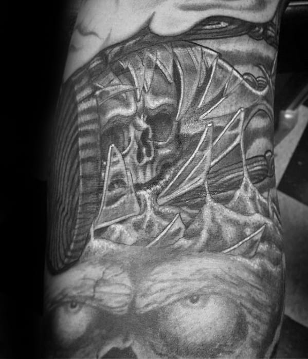 Black And Grey Ink Broken Hourglass Skull Mens Arm Tattoos