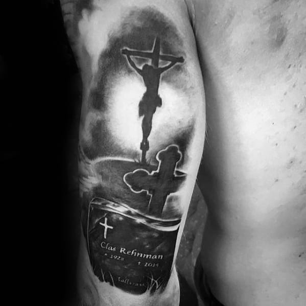 Black And Grey Ink Jesus Memorial Grave With Cross Mens Arm Tattoo
