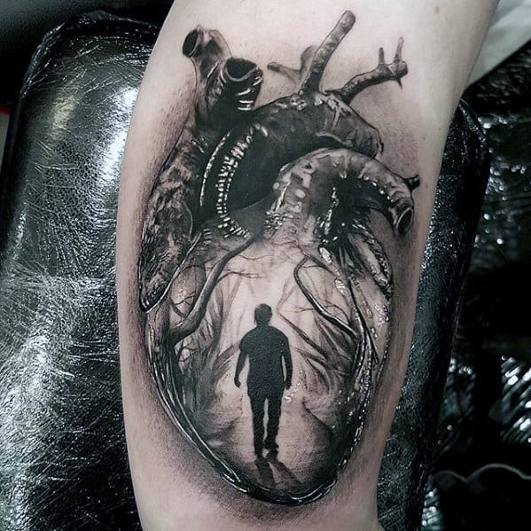 Black And Grey Man Walking In Anatomical Heart Mens Realistic Arm Tattoo