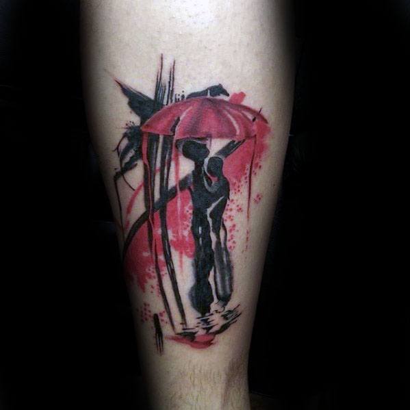 Black And Red Ink Watercolor Back Of Leg Umbrella Tattoo On Men