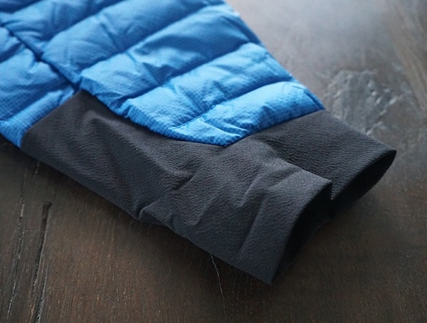 Black And Snorkel Blue Blackyak Bakosi Jacket For Men Rolled Cuff Sleeve Detail