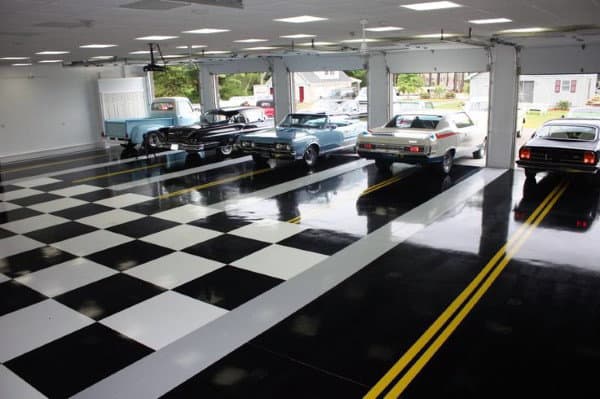 Black And White Checkered Garage Floor With Yellow Road Lines