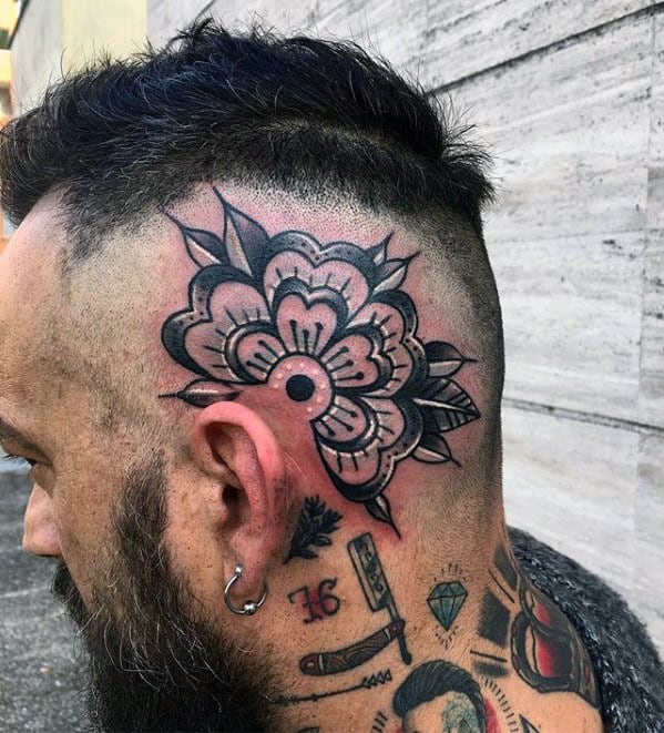 black-and-white-ink-guys-traditional-flower-head-tattoo