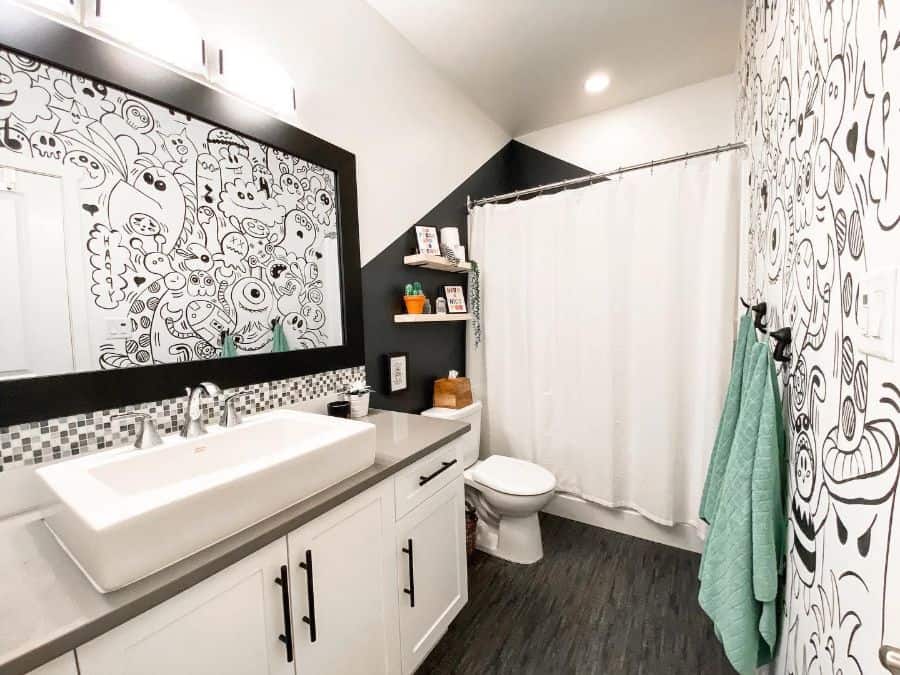 black and white kids' bathroom funky carton feature wall large mirror