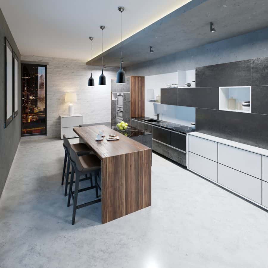 Modern kitchen with wood dining island, black cabinets, white shelving, and pendant lighting.