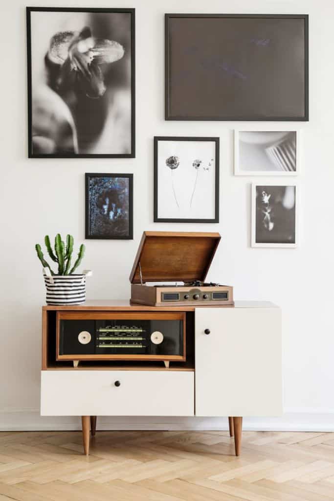 vintage record player and photo wall art living space