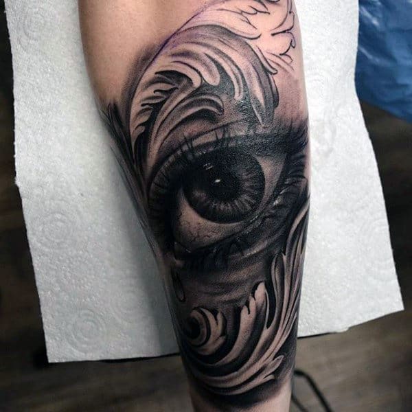 Black Eye With Teardrop And Gray Feather Tattoo Mens Forearms