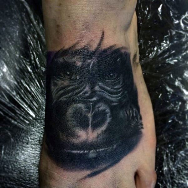 Black Gorilla Tattoo On Guys Foot