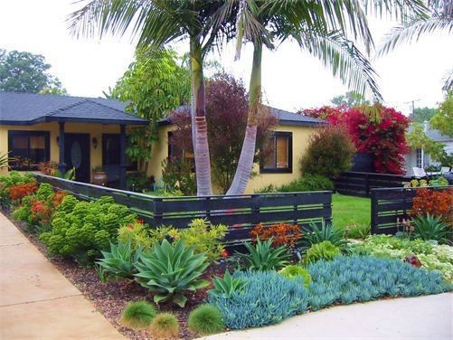 black wood front yard fence 